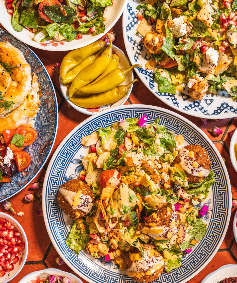 table with colourful lebanese dishes 